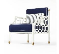 Cushion Lounge Chair in blue fabric with a white frame and brass accents from Castelle
