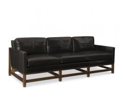 Ledbury Sofa with a black fabric and brown legs and from from Fine Furniture Design