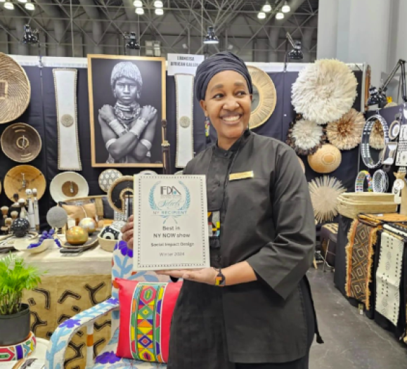Rose Luangisa accepting the Social Impact Design Award at NY Now