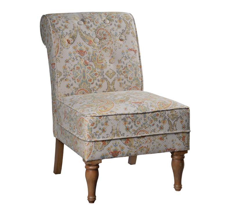 Lily Chair with carved front legs, a rounded back, buttons and a distressed floral pattern fabric from Forty West Designs