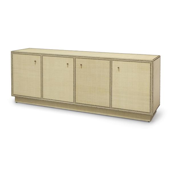 The natural raffia on Palecek’s Benton sideboard is formalized with antique brass nailheads and handles. www.palecek.com