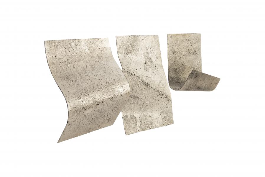 Phillips Collection’s Antique Iron Sheet wall tiles create soft texture with sturdy material. This handmade pillow from Aviva Stanoff’s Stardust Collection has a silk duponi back with a complementary metallic look and feel. www.phillipscollection.com, www.avivastanoff.com