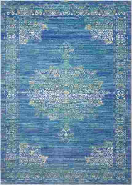 Nourison’s DLM01 rug from its Delmar Collection has an antique-inspired floral and medallion design laid out in teal, white, gold and sapphire. Powerloomed with  100 percent polyester  for easy care.  www.nourison.com